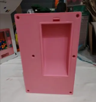 Dispensadora de caramelos rosa