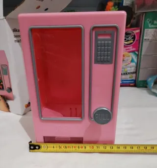 Dispensadora de caramelos rosa