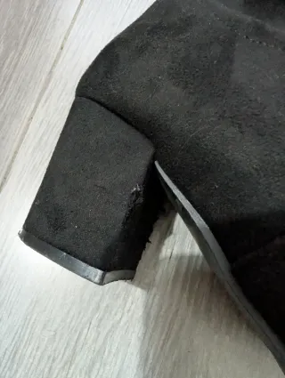 Botas altas ante tipo mosqueteras