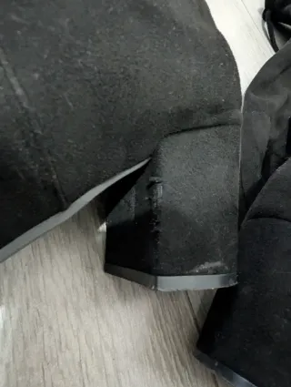 Botas altas ante tipo mosqueteras