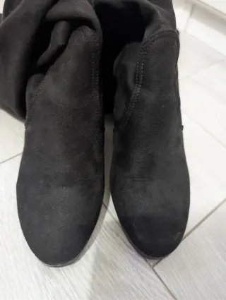 Botas altas ante tipo mosqueteras