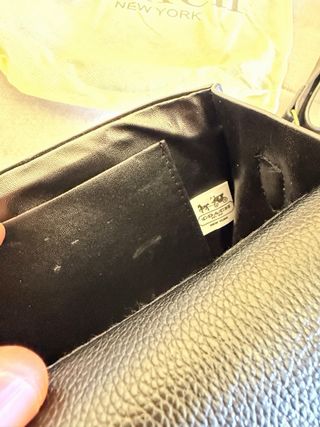 Mala de ombro Coach Tabby preta dourada