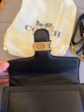 Mala de ombro Coach Tabby preta dourada