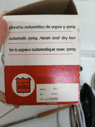 Plancha de ropa antigua