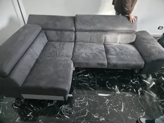 Divano angolare con poggiapiedi estraibile