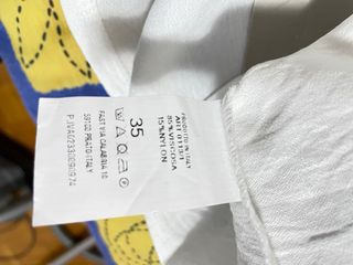 Gilet bianco con bottoni