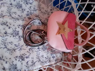 Bolso juvenil rosa con estrella dorada