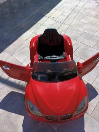 Coche eléctrico infantil rojo
