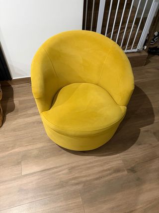 Poltrona girevole in velluto giallo