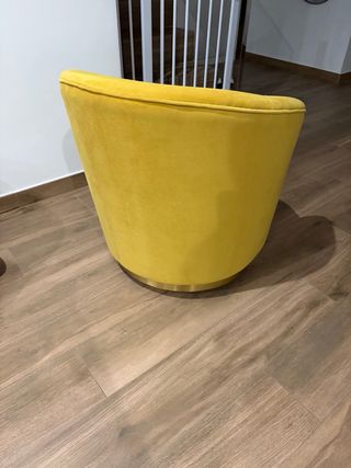 Poltrona girevole in velluto giallo