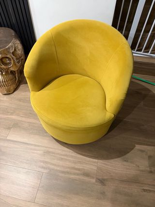 Poltrona girevole in velluto giallo