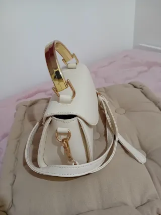 Borsa panna con manico dorato