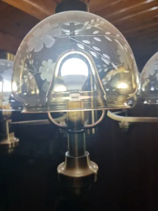 Lámpara colgante dorada matizada y transparente