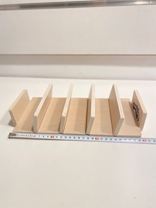 Espositore per scatole puzzle in legno Small Foot