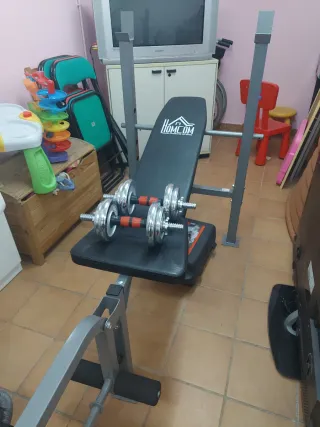 Banco de pesas y kit de mancuernas