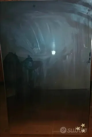 Specchio da muro in vetro e metallo