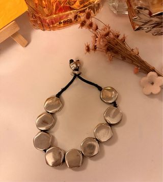 Pulsera Uno de 50 Plata y Cordón Negro