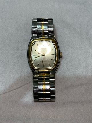 Reloj Casio Dorado y Plateado