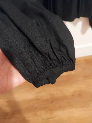 Blusa negra Benetton manga larga