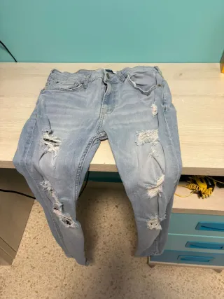 Vaqueros desgastados hombre