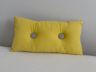 Cojín reversible gris y amarillo