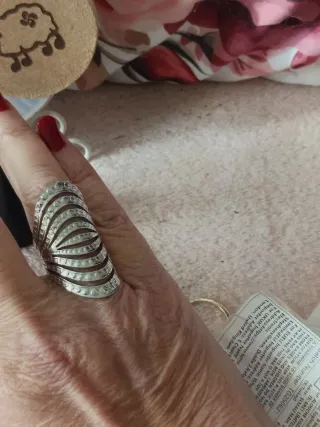 Anillo Acero plateado con diseño curvo