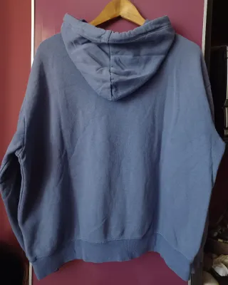 Sudadera con capucha azul de chica. Talla M.