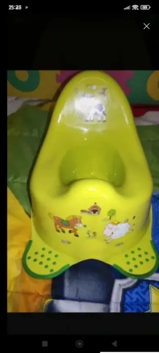 Orinal infantil con diseño de vaca