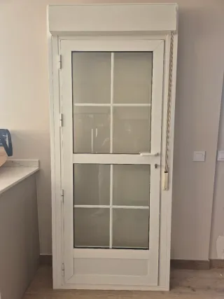 Puerta aluminio balconera