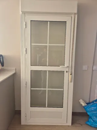 Puerta aluminio balconera