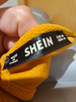 Top sin mangas mostaza