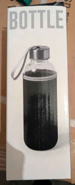 Botella de agua de cristal con funda