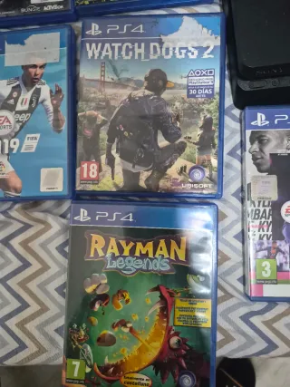 PS4 (PlayStation 4) con 2 mandos y 11 juegos