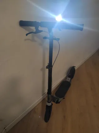 Patinete en buen estado como nuevo .