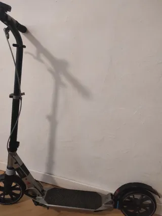 Patinete en buen estado como nuevo .