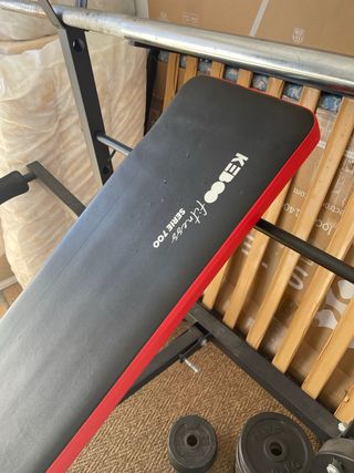 Banco de pesas y discos