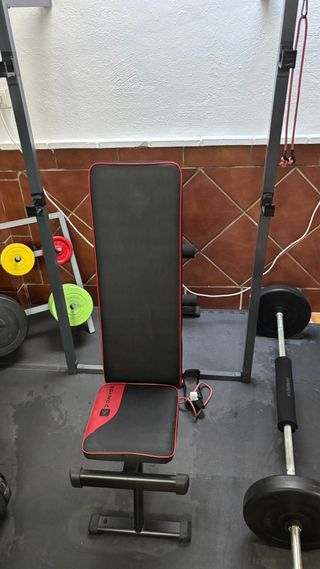 Barra de pesas con discos y agarre