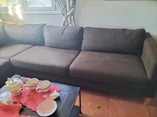 Sofá esquinero IKEA grande con puff