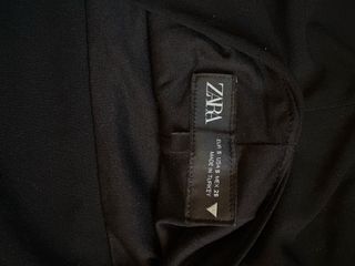 Top negro con detalles en en pedrería