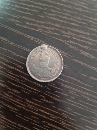 Moneda antigua de plata