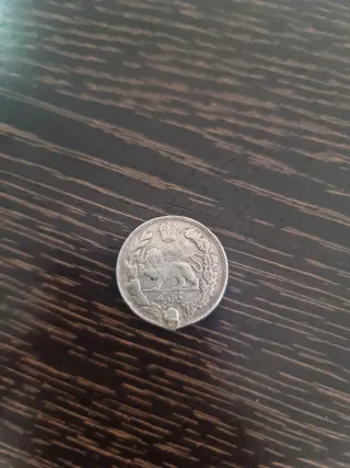 Moneda antigua de plata