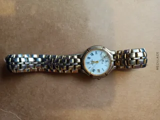 Reloj Lotus Dorado y Plateado