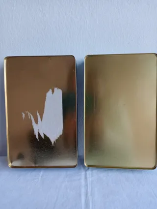 Scatole di latta con stampe artistiche