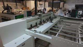 SECCIONADORA CON CARGA AUTOMATICA