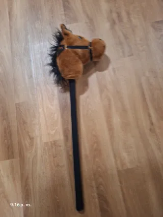 Cabeza de caballo de peluche con palo
