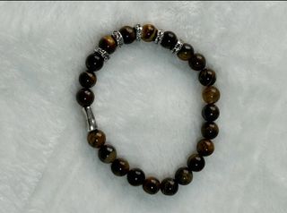 Pulsera bolas elástica color carey y baño de plata