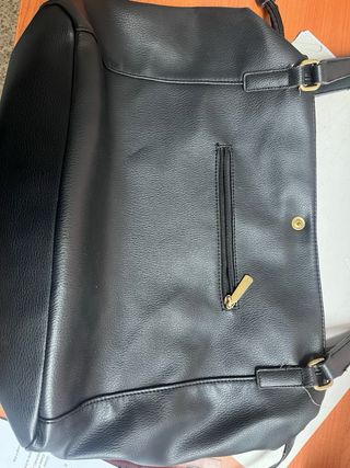 Borsa Conbipel borchie