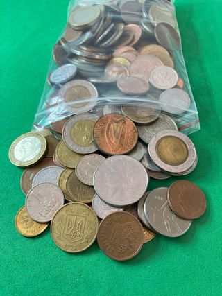 L#585 0,8 Kilos de monedas de diferentes países