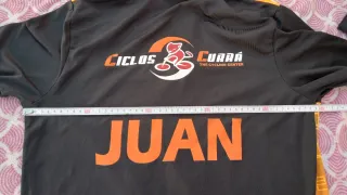 Camiseta Joma naranja y negra