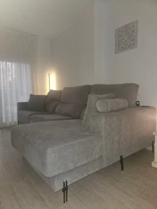 Sofá chais longue gris tela